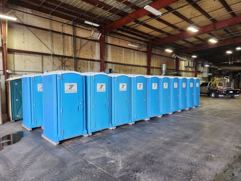 Brower Inc. portable restroom fleet clean and ready in warehouse in Newkirk, Oklahoma