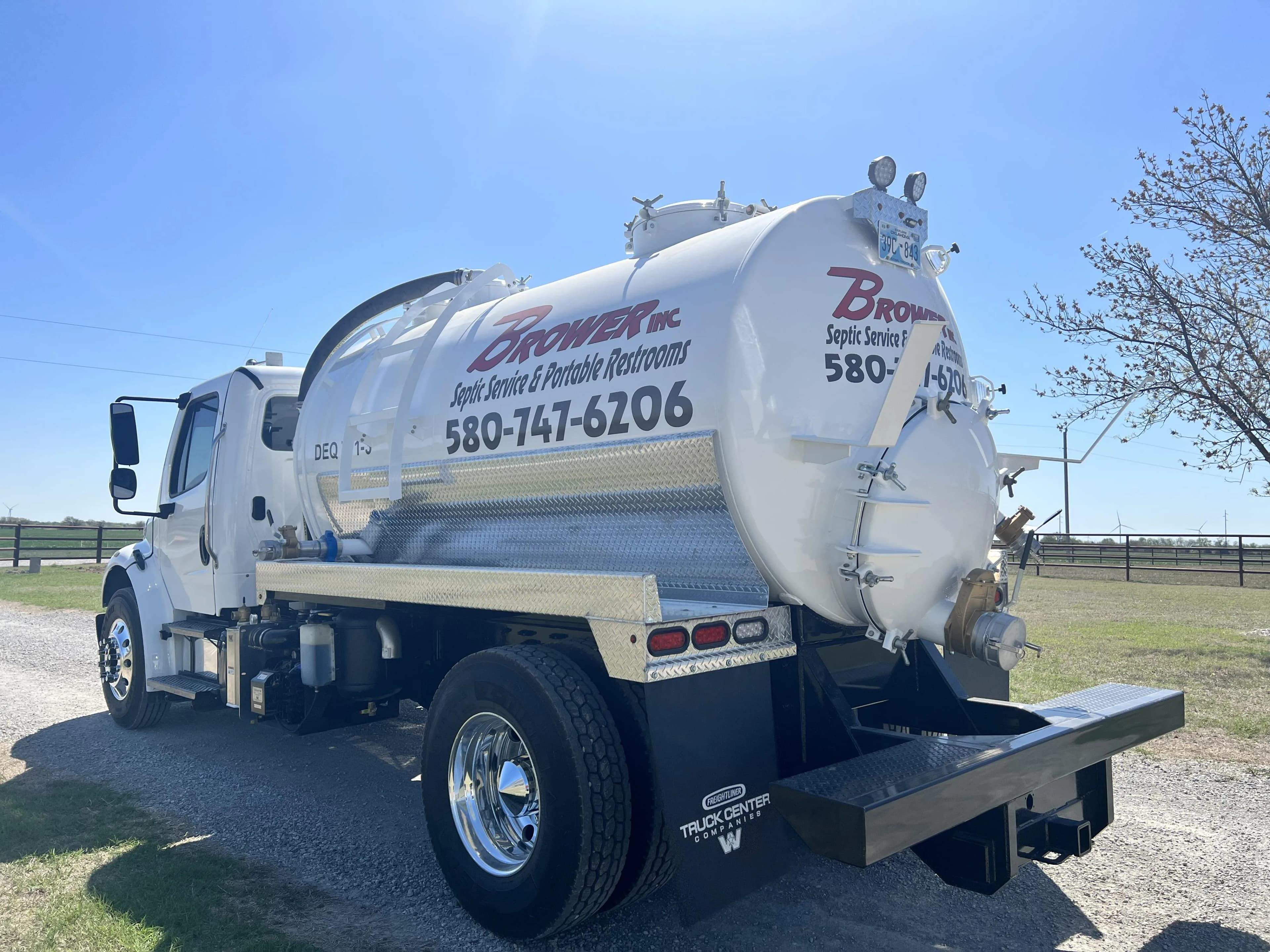 Brower Inc. branded septic pump truck rear view at job site in Newkirk, Oklahoma