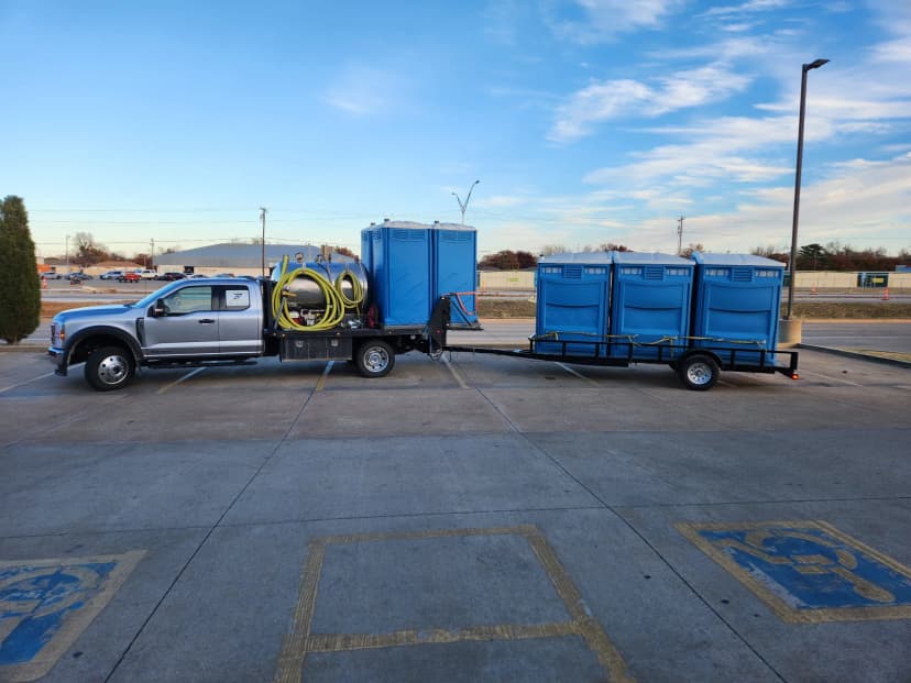 VIP restroom trailer exterior closeup with branding
