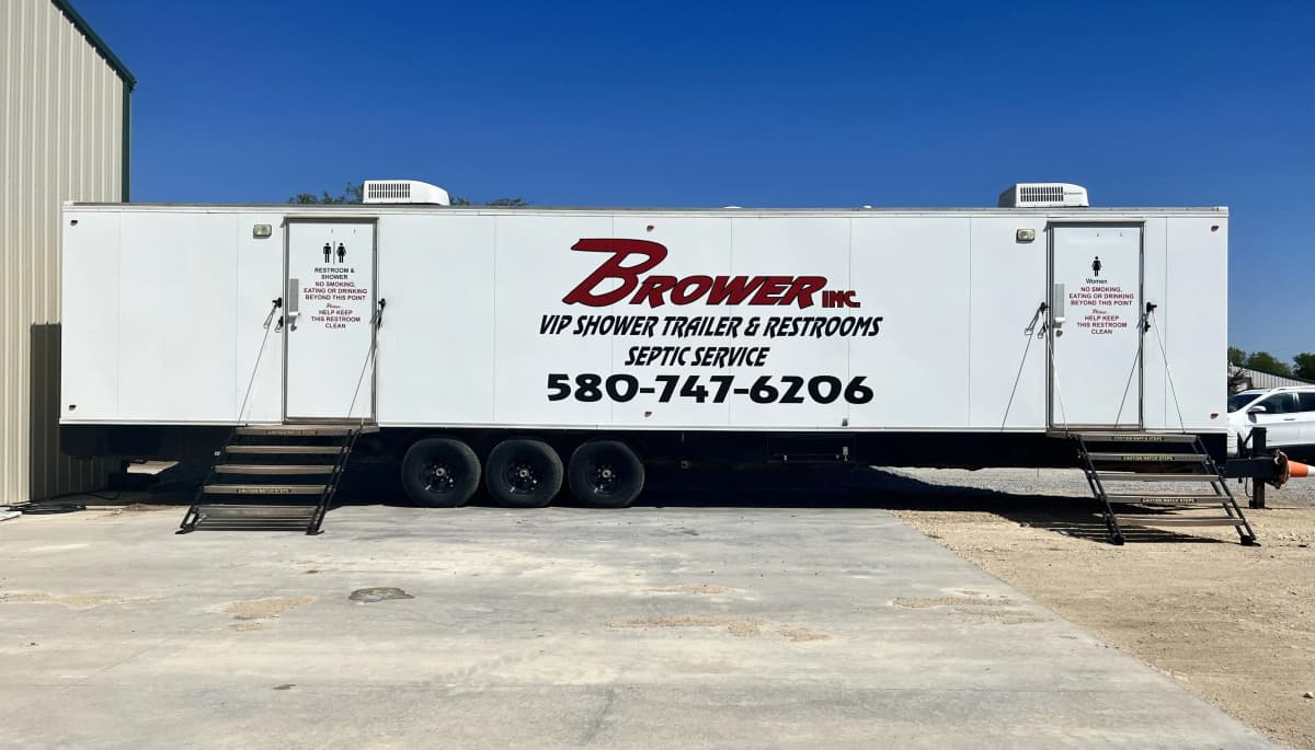Brower Inc. VIP shower and restroom trailer exterior with branding in Newkirk, Oklahoma